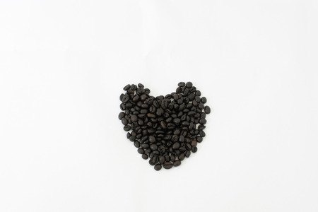 roasted coffee beans isolated in white background cutoutの写真素材
