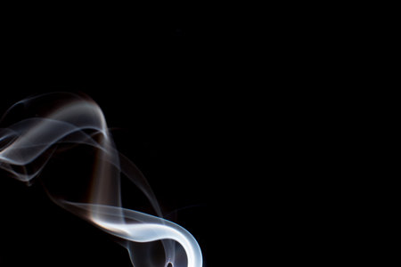 smoke on black background. the smoke is white background is black.