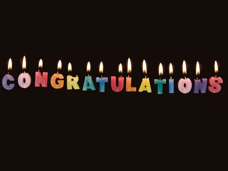 Wax candles spelling Congratulationsの写真素材