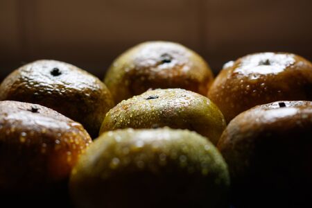 group of orange fruit with water drop,drama sceneの写真素材