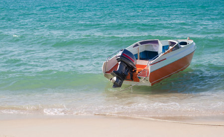speed boat on beach waiting for traveller