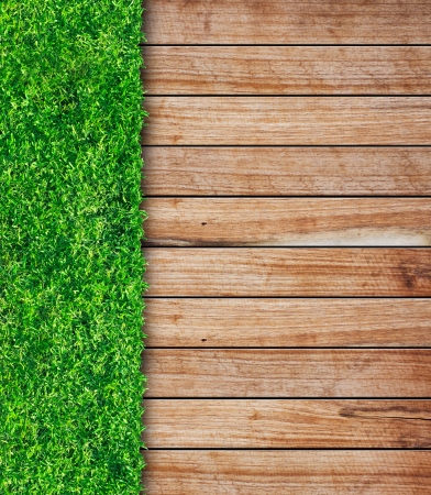 wooden with green grass backgroundの写真素材