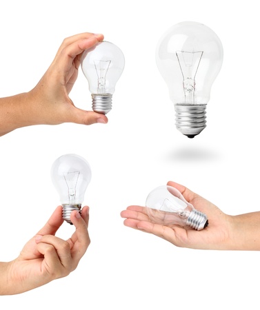 Light bulb idea in hand, isolated on white background objects with clipping paths for design workの写真素材