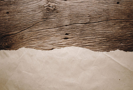 old brown paper on wood backgroundの写真素材