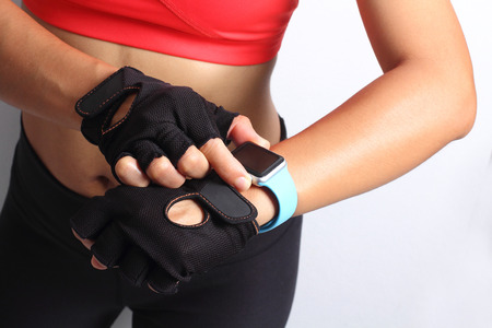 Sportswoman wearing smartwatch device.の写真素材