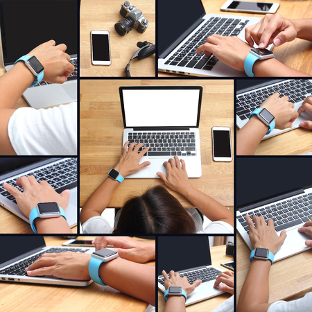 Hands of woman wearing smartwatch on the keyboard of her laptop computer. Female working on laptopの写真素材