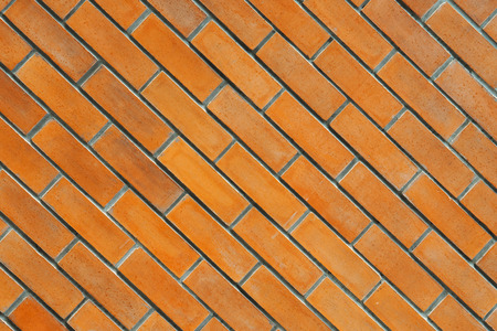 Orange brick wall diagonalの写真素材