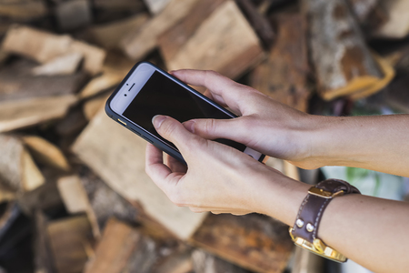 Hands with mobile phoneのeditorial素材