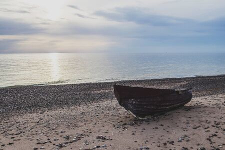 the sea is a lonely boatの写真素材