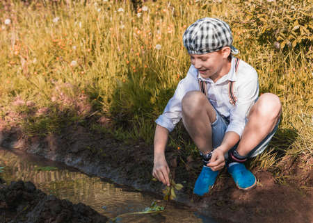 they're showing emotion and cheerful boyの写真素材