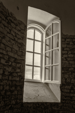 very old, ancient wall with interesting windowsのeditorial素材