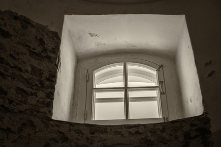 very old, ancient wall with interesting windowsのeditorial素材