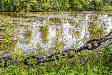 very old, rusted chains on bridges and streetsの写真素材
