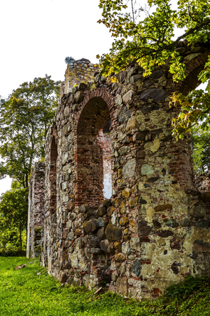 very old Kazdangas church wall of stones.の写真素材