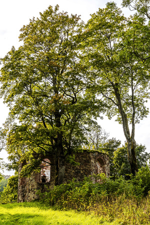 very old Kazdangas church wall of stones.の写真素材