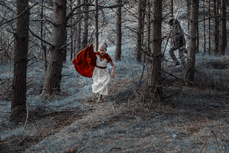 Children play in the Little Red Riding Hood and the wolfの写真素材