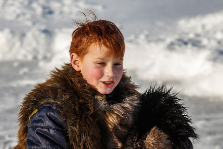The little boy dressed up for winter.の写真素材