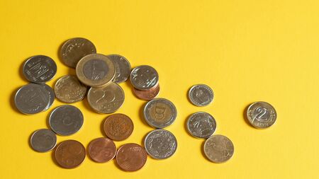 Coins on bright background for finance conceptual. Coin collecting and numismatistの写真素材