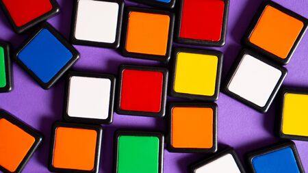 Scattered colorful squares as background. Backdrop for smart and educational games. Kids imagination concept.の写真素材