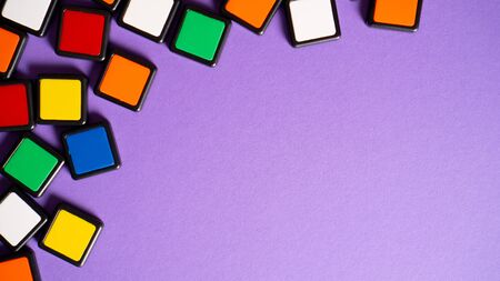 Colorful abstract purple backdrop with frame and space for your text. Violet background with colorful squares. Lilacの写真素材