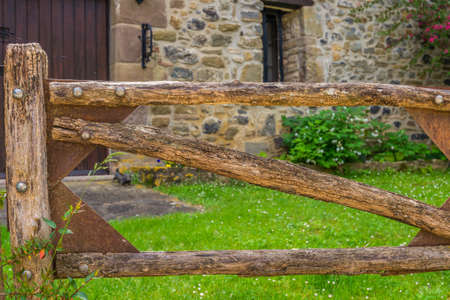 Wooden gate in a little village.の写真素材