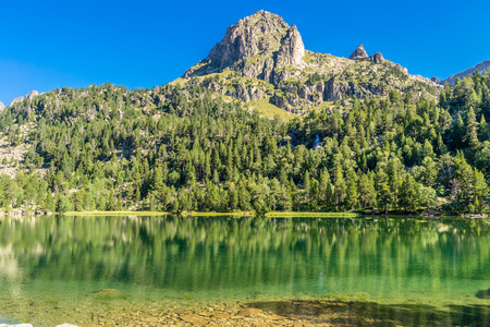 View of the Lake Ratera, St.Maurici National Park.の写真素材