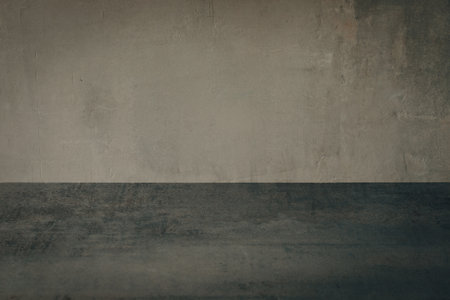 Beautiful gothic art background of roughly plastered wall and empty gray table surface, copy space.の写真素材