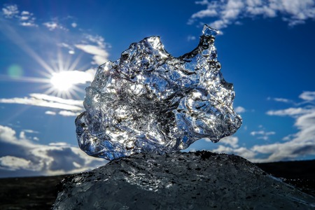 Melting iceblock in the sunshineの写真素材