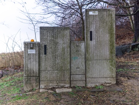 A waste and decay dsl cabinet in the nature.の写真素材
