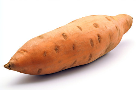 Raw sweet potato on a white background. Orange potato is organic. Ai generative.の素材