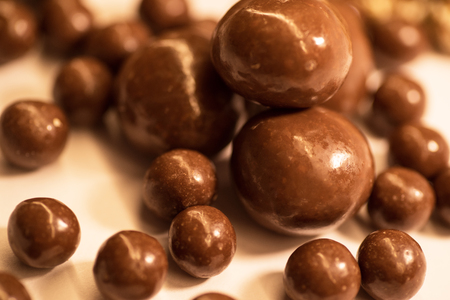 Chocolate tile with chocolate ballsの写真素材