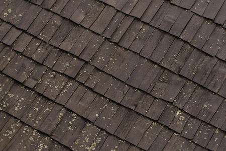 Wooden tile on the roof of the house. Wooden shingles.の写真素材