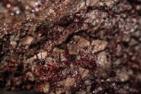 Natural stone wall background or texture. Limestone rock in close up viewの写真素材