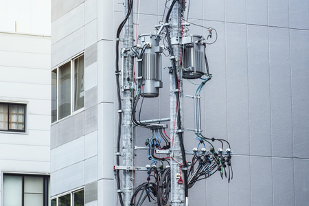 Modern poles with electric wires, telecommunication pole .backgroundの写真素材