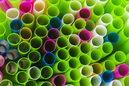 Abstract colorful background. Background from cocktail tubes close up. Soft focus. Cocktail tubes of different colors close up.Close-up of straw tubes.の素材 [FY310119203754]