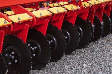 An image of a fragment of an agricultural machine. Trailer Hitch for tractors and combines. Trailers for agricultural machinery.Cultivator.の写真素材