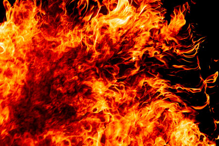Wood fire on black background.Fire on a dark background. Background from fire. Fire close up....