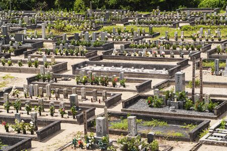 Cemetery in Japan, the city of Shima, August 2018. Japanese well-kept cemetery on a summer day.のeditorial素材