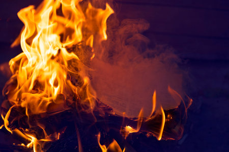 Burning pages of books. Books on fire. Background from burning books.Burning thoughts, news. Books...