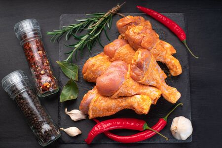 Uncooked marinated chicken.Raw spiced Chicken Wings before cooking for grill and bbq.の写真素材