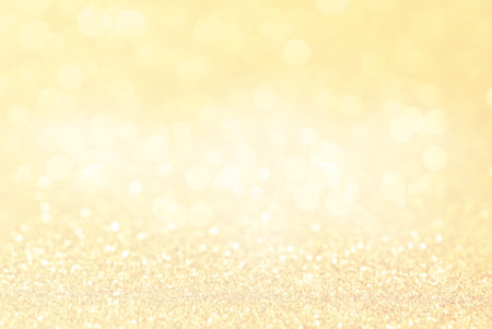 Gold background. Soft focus. Selective focus. Defocus light.Abstract holiday background, beautiful...