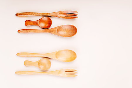 Utensils and devices made of natural materials.Plastic free concept.Set of eco friendly bamboo eating , wooden cutlery. Zero waste.Wooden cutlery for reusable use.Environmental protection concept.の写真素材