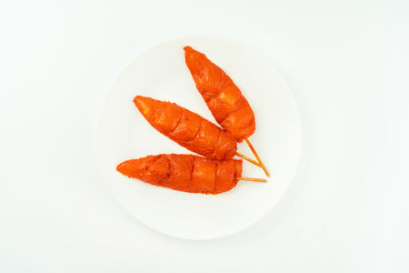 Chicken fillet inner skewers.Food concept.Fresh raw marinated chicken meat skewers iner fillet on a white background.Top view.Copy space.Food for retail.Ogranic food,healthy eating.の写真素材