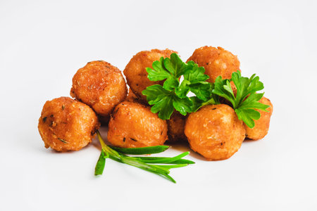 Chicken Breaded Fillet.Fast food. Breaded Chicken Inner Fillet on a White Background,Chicken Breaded Raw Meat. Fast cooking. Breaded chicken nuggets. Homemade food at home.の写真素材