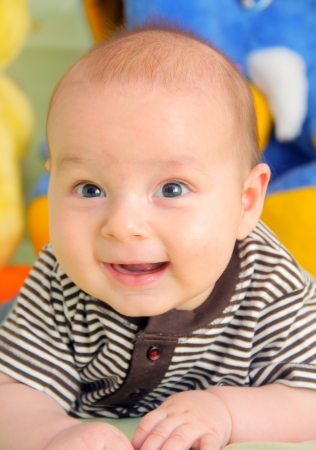 Portrait of a laughing, happy babyの写真素材