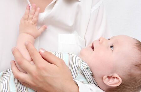 baby in motherの写真素材