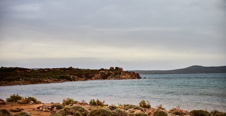 Beautiful view of the sea cape in a cloudy pagoda. Shallow depth of field.