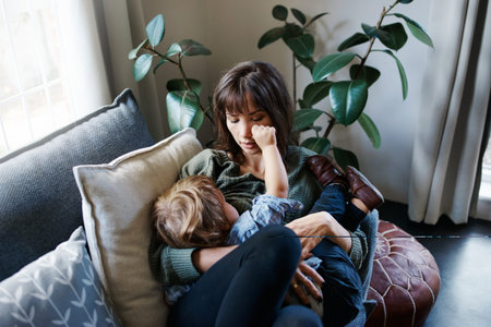 Cropped shot of a young woman spending quality time at home with her son