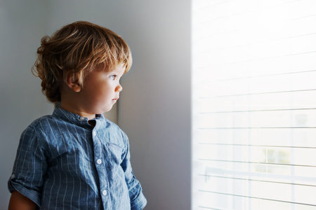 Shot of an adorable little boy at homeの写真素材
