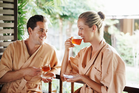 Shot of a young couple enjoying a refreshing tea break at a day spa